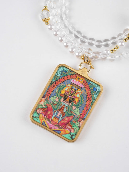 Hand-painted Tibetan Mahakala Thangka Gau pendant symbolizing divine protection and strength.