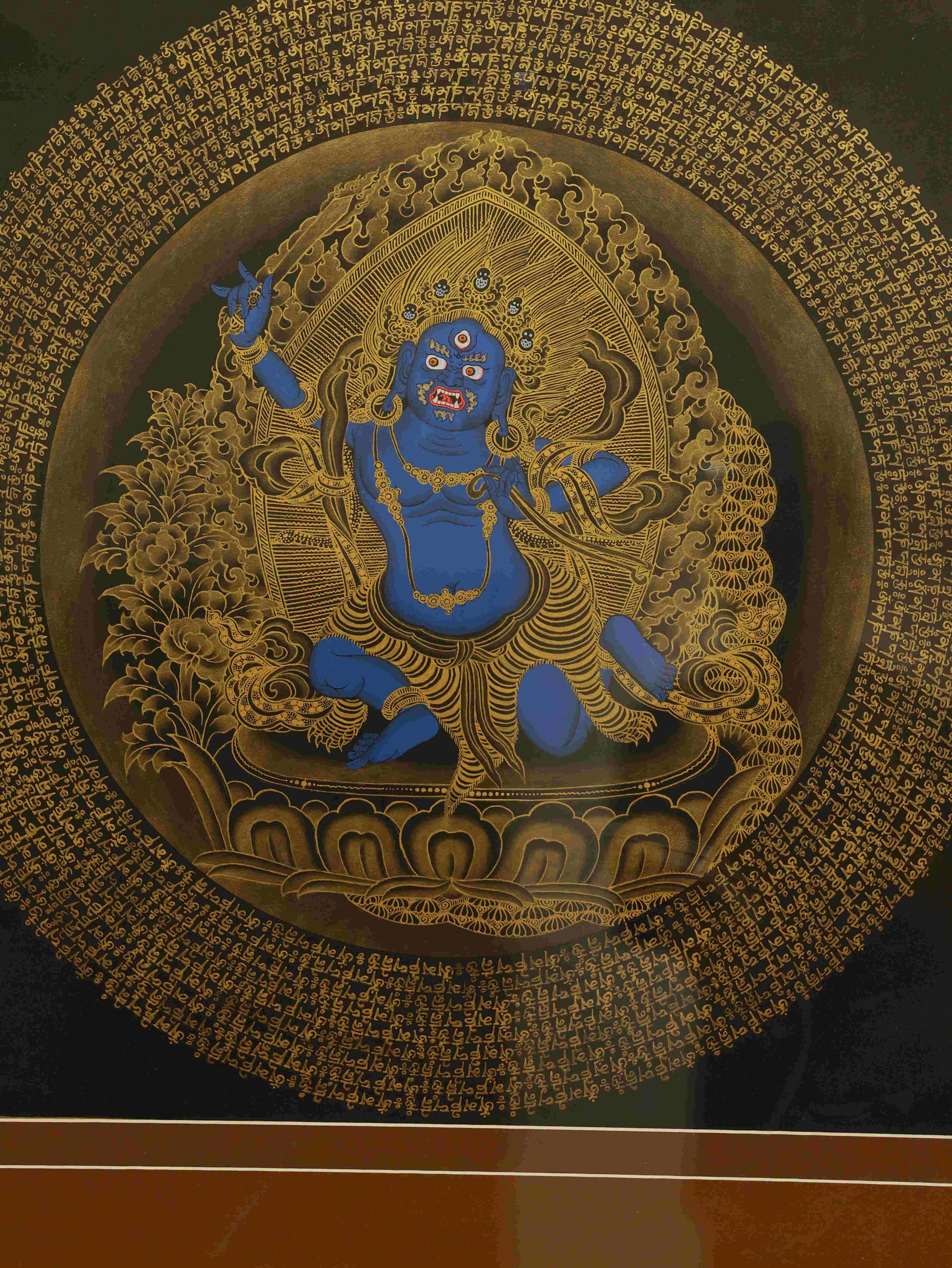Hand-painted Tibetan Mahakala Thangka painting symbolizing protection, wisdom, and spiritual strength.
