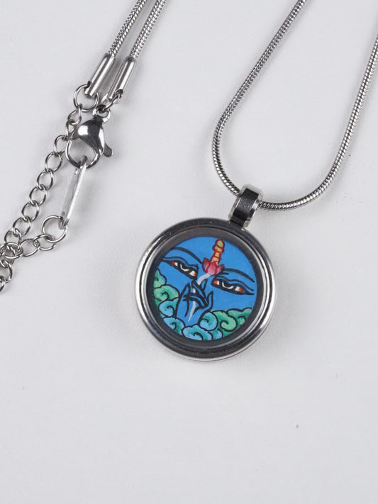 Hand-painted Tibetan Buddhist Vajrapani Thangka pendant necklace crafted on thangka canvas with mineral pigments, a sacred Tibetan Buddha art symbol of strength and protection.