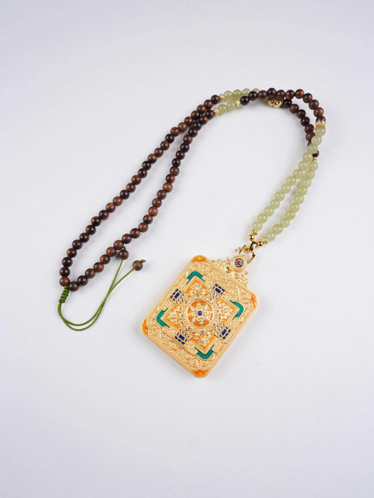 Mini Tibetan Thangka pendant of Vajrapani, the protector deity symbolizing courage and inner strength.