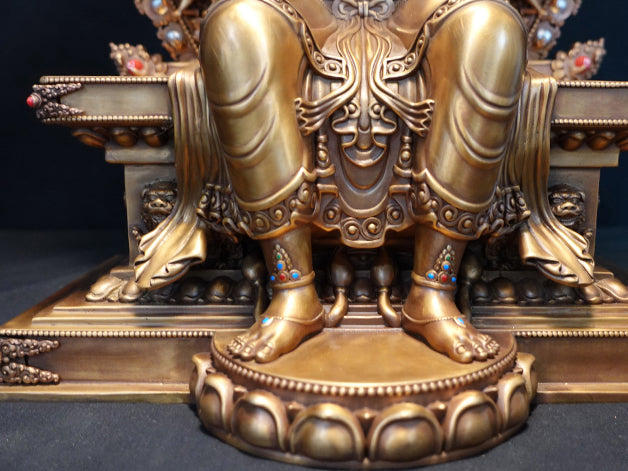 "Antique Tibetan Buddhist Maitreya Buddha sculpture in red copper with gilt finish, symbolizing wisdom and peace."