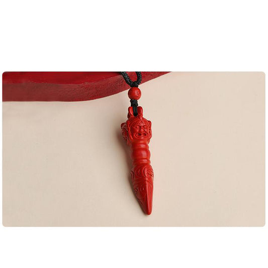 Tibetan Buddhist necklace made of red sandstone, with hand-painted thangka art, representing Tibetan culture and spirituality.”