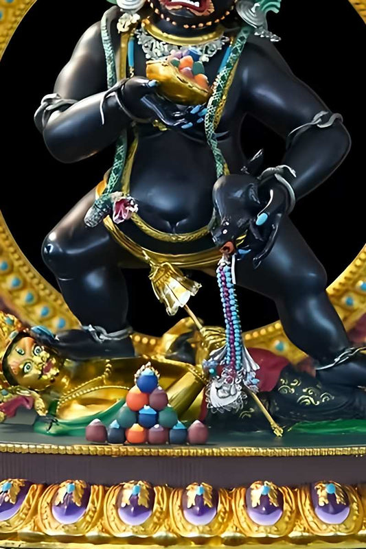 Exquisite, hand-painted Tibetan Buddhist Black Jambhala copper sculpture, a ritual wealth deity masterpiece showcasing fine details in traditional Buddhist art.