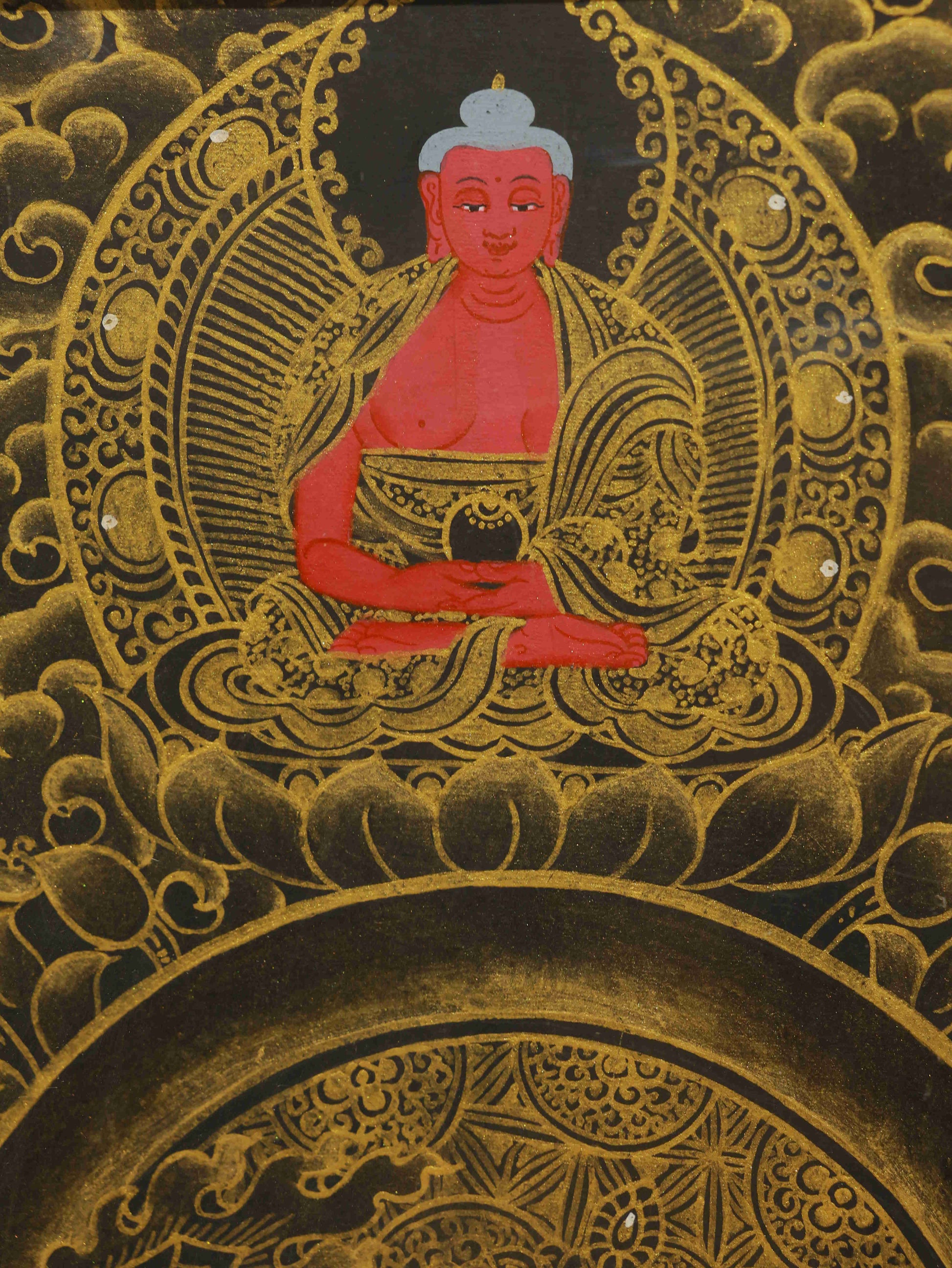 Golden-outline Vajrasattva Thangka in black-gold hues, representing tantric wisdom and compassion.