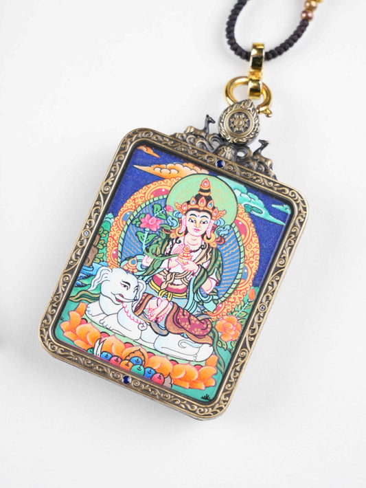 Handcrafted Tibetan Samantabhadra thangka pendant featuring zodiac protection and enlightenment blessings, made with mineral pigments on authentic thangka fabric.