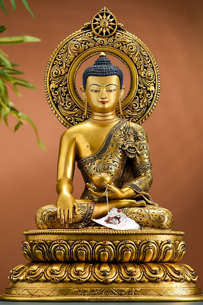 Authentic Tibetan Buddha statue of Shakyamuni, handcrafted and hand-painted in mineral colors, ideal for Buddhist shrines or decor.