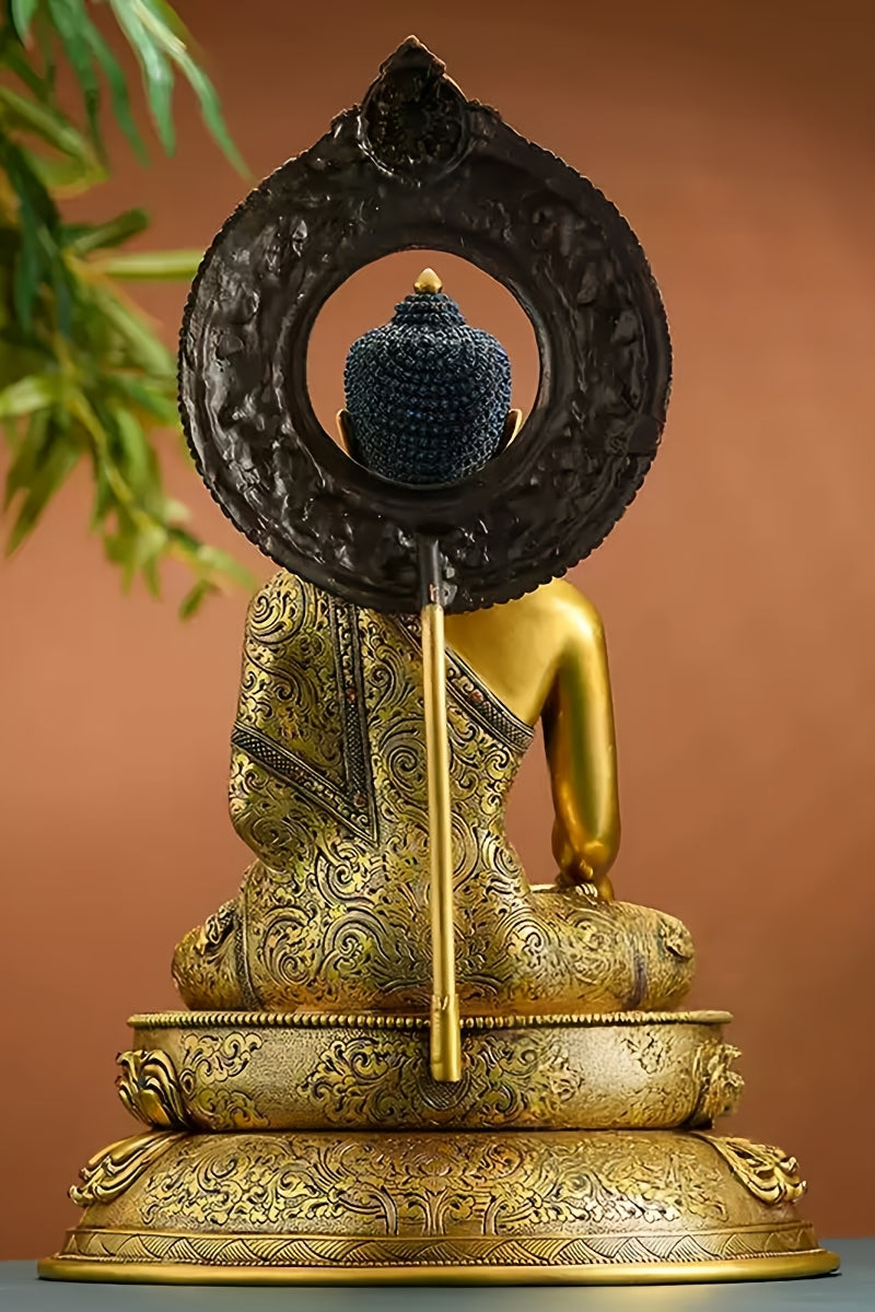 Sacred handcrafted Tibetan Shakyamuni Buddha statue in copper, showcasing refined details and traditional Tibetan Buddha artistry.