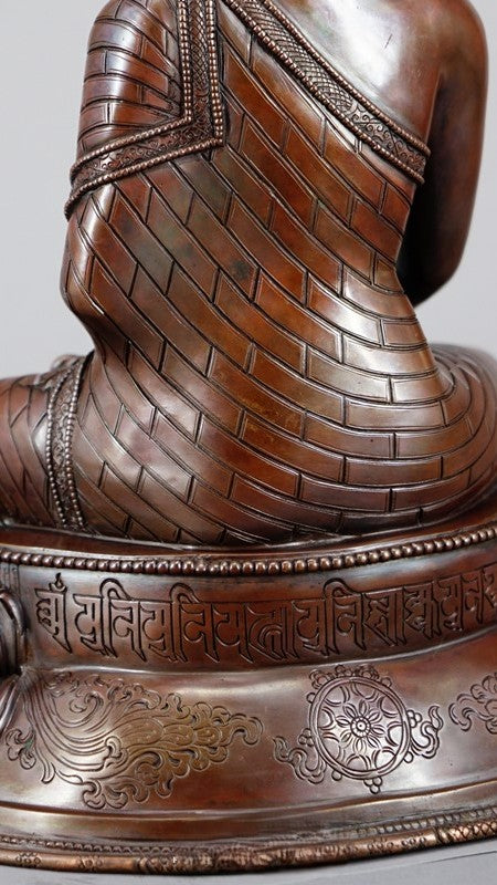 Shakyamuni Buddha Statue made from pure copper and mineral pigments, handcrafted with intricate details, perfect for meditation and spiritual practices.