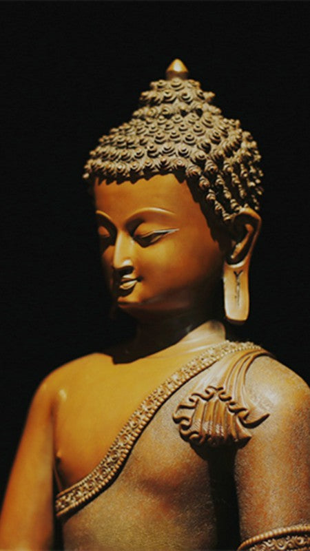 "Handmade Tibetan Buddhist Shakyamuni Buddha statue crafted from copper and mineral pigments. Perfect for meditation spaces and spiritual decor."