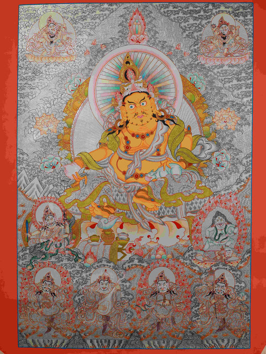 Hand-painted Tibetan Buddhist Silver Foil Yellow Dzambhala Thangka Painting – traditional Tibetan thangka art symbolizing wealth and prosperity.