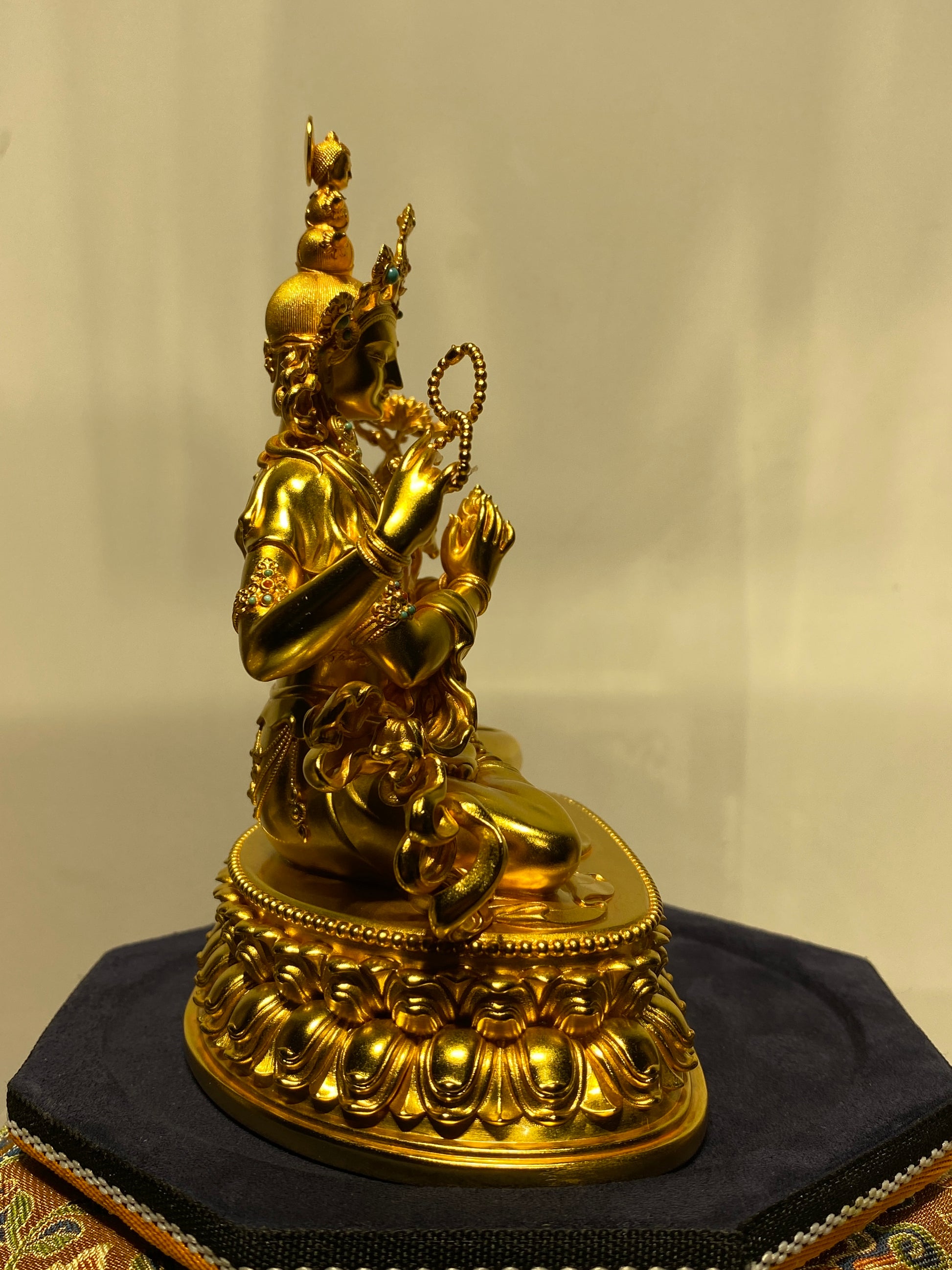 Handcrafted Tibetan-buddhist Vajrapani statue, silver-gilded Bodhisattva with serene expression, Tibetan Buddha art.