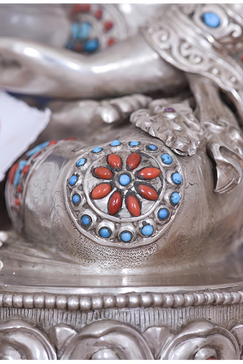 Traditional Tibetan-buddhist silver Shakyamuni Buddha statue, pure handmade craftsmanship and detailed Buddha art.