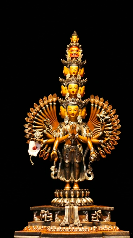 Handcrafted Tibetan-Buddhist Thousand-Arm Avalokiteshvara Buddha Statue in purple copper, intricately painted, symbolizing infinite compassion and spiritual protection.