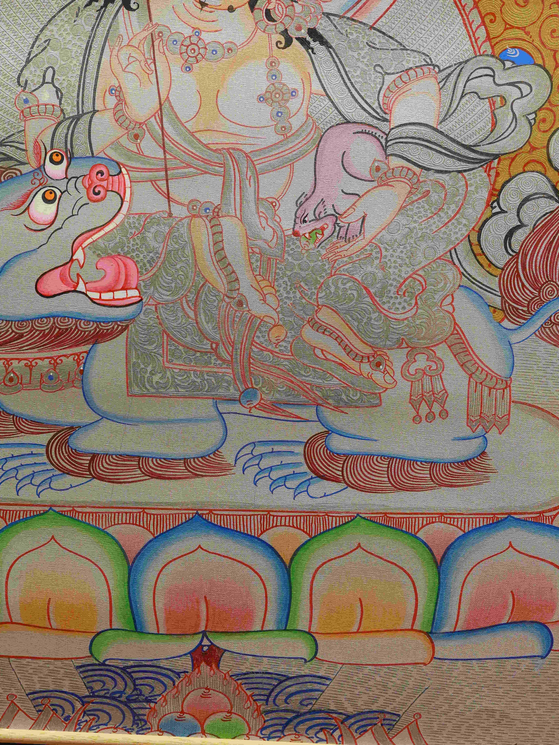 Handcrafted Silver Foil Tibetan Buddhist Thangka of Yellow Dzambhala – detailed wealth deity painting.