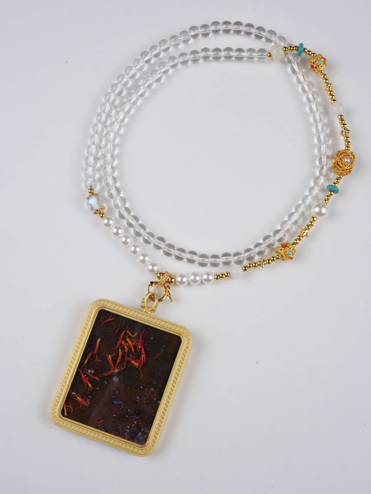 : Traditional Tibetan Thangka Pendant with Natural Mineral Pigments - Vivid and lasting depiction of Manjushri on a sacred Gau locket.