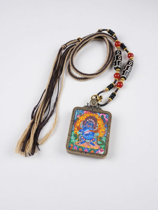 Hand-painted Tibetan Vajrapani Thangka Gau pendant symbolizing power and spiritual protection.