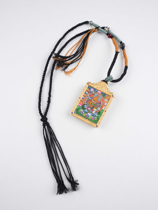 Hand-painted Tibetan Buddhist Wealth King Dzambhala thangka pendant on traditional thangka canvas with mineral pigments, symbolizing prosperity and spiritual protection.