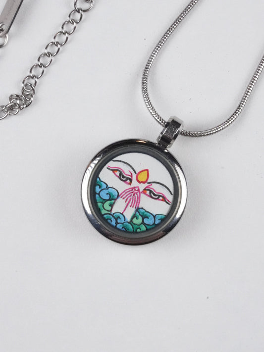 Hand-painted Four-Armed Avalokiteshvara circular Thangka pendant from Tibet with gold and mineral pigments