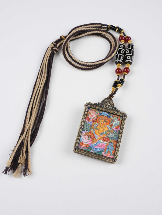Hand-painted Tibetan Buddhist Yellow Dzambhala thangka pendant symbolizing wealth, abundance, and prosperity.