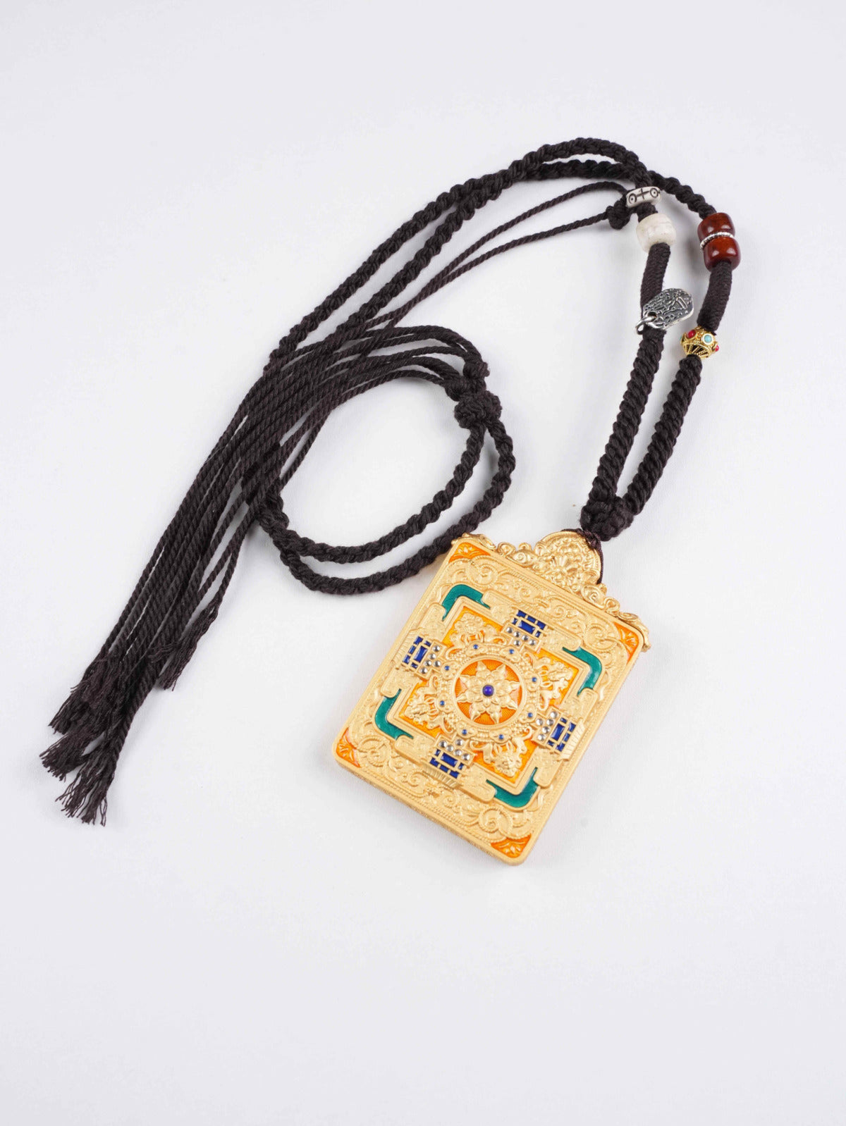 Mini Tibetan thangka pendant of Yellow Dzambhala, the Buddhist Wealth King, painted with natural mineral pigments on thangka canvas, offering prosperity and luck.