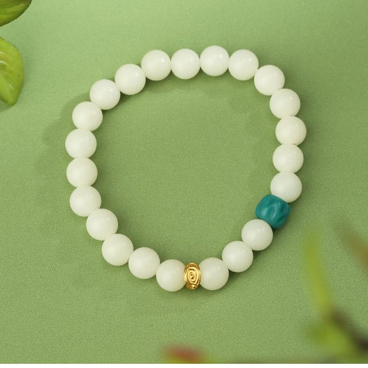 Handmade Tibetan-Buddhist Zhiqinglu Bodhi bracelet with 925 silver wisdom-eye bead and glass accent