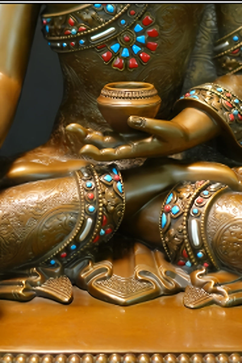 Colorful handcrafted Shakyamuni Buddha brass statue, featuring traditional Tibetan Buddhist art and intricate designs.