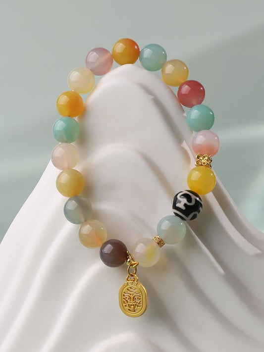 Tibetan-Buddhist Agate Dzi Bracelet · Handmade Agate Beads with Copper Floral Fittings and Zaki Charm