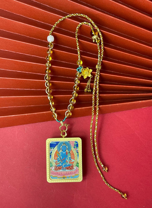 Wisdom as Weapon: Rekong Akasagarbha Thangka Pendant with Silver Casing