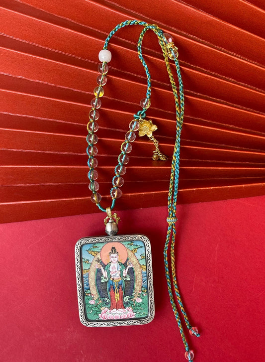 Open Eyes to Dharma and Compassion: Tibet Eyes-Opening Avalokiteshvara Thangka Pendant with Copper Casing