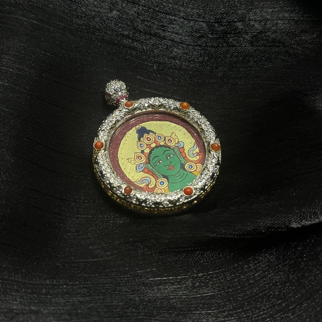 The Liberator from Eight Dangers: Green Tara Buddha Head in the Rekong Red-Gold Tradition