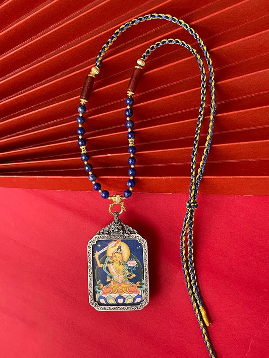 Wisdom and Family Happiness: Tibet Coarse Manjushri Thangka Pendant with Refined Silver Casing