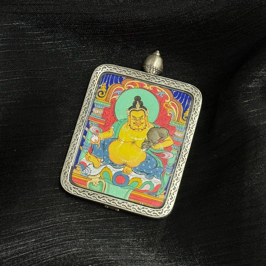 Yellow Jambhala Chigung Thangka Pendant: The King of Wealth Deities  Meta Description (155 chars): Hand-paint