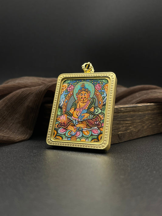 The Chief of Wealth Deities: Nepal Yellow Jambhala Thangka Pendant with Titanium Casing