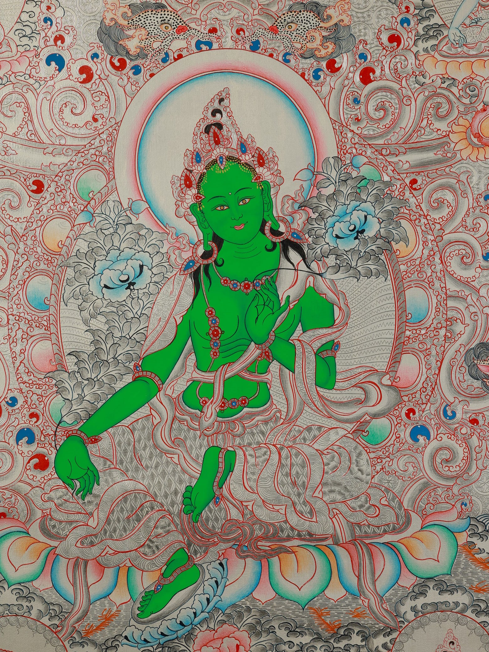 Green Tara Thangka symbolizing prosperity and abundance in Tibetan Buddhism.