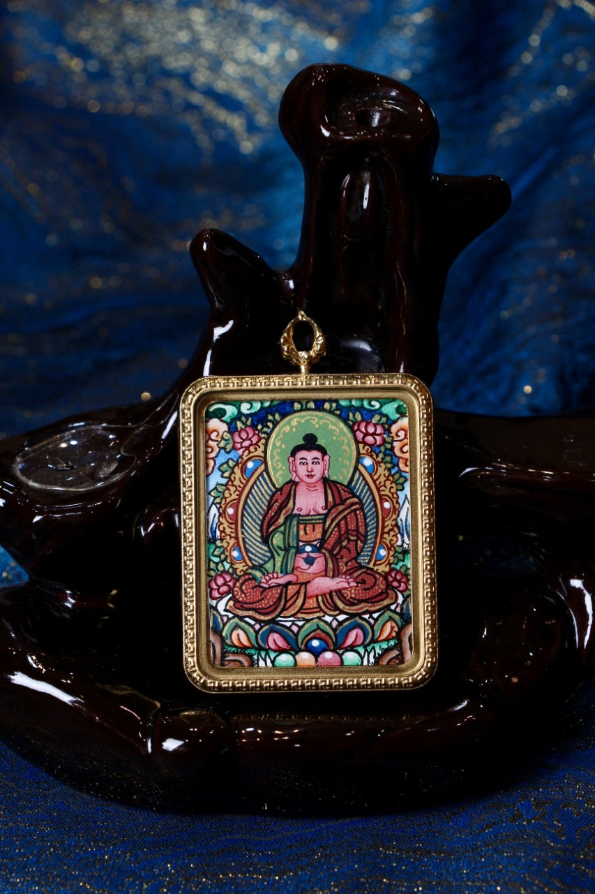 Amitabha Buddha Thangka Pendant in Tibetan Buddhist culture, symbolizing peace and enlightenment.