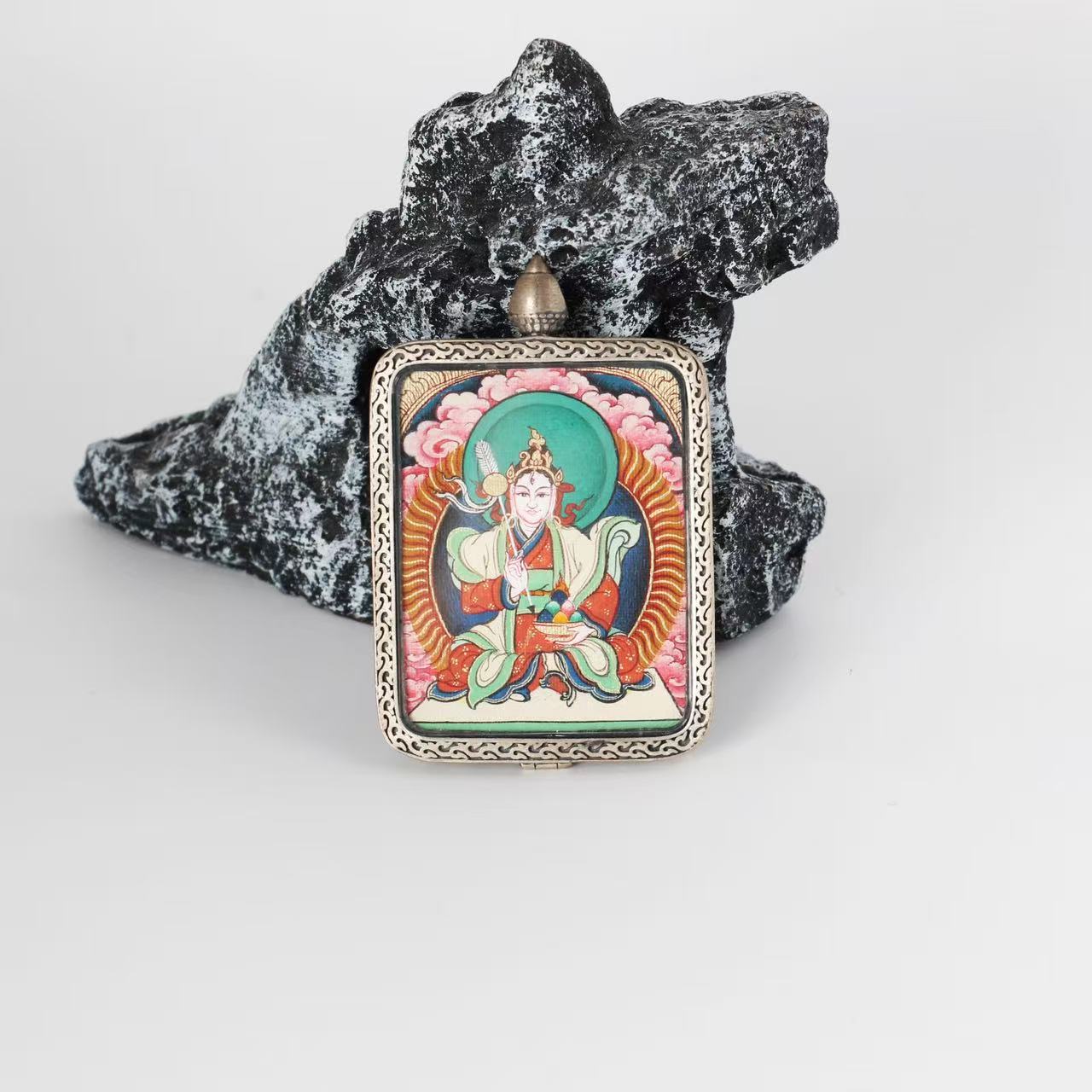  Close-up detail of the Rebgong Palden Lhamo Thangka painting showing intricate natural mineral pigment work, showcasing the masterful artistry of Tibetan lineage painters.
