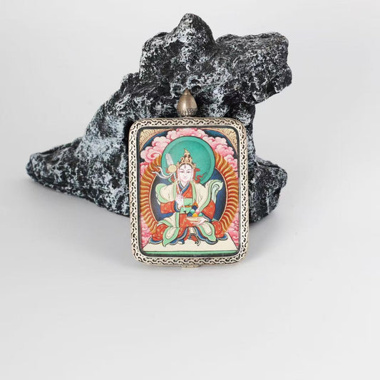  Close-up detail of the Rebgong Palden Lhamo Thangka painting showing intricate natural mineral pigment work, showcasing the masterful artistry of Tibetan lineage painters.
