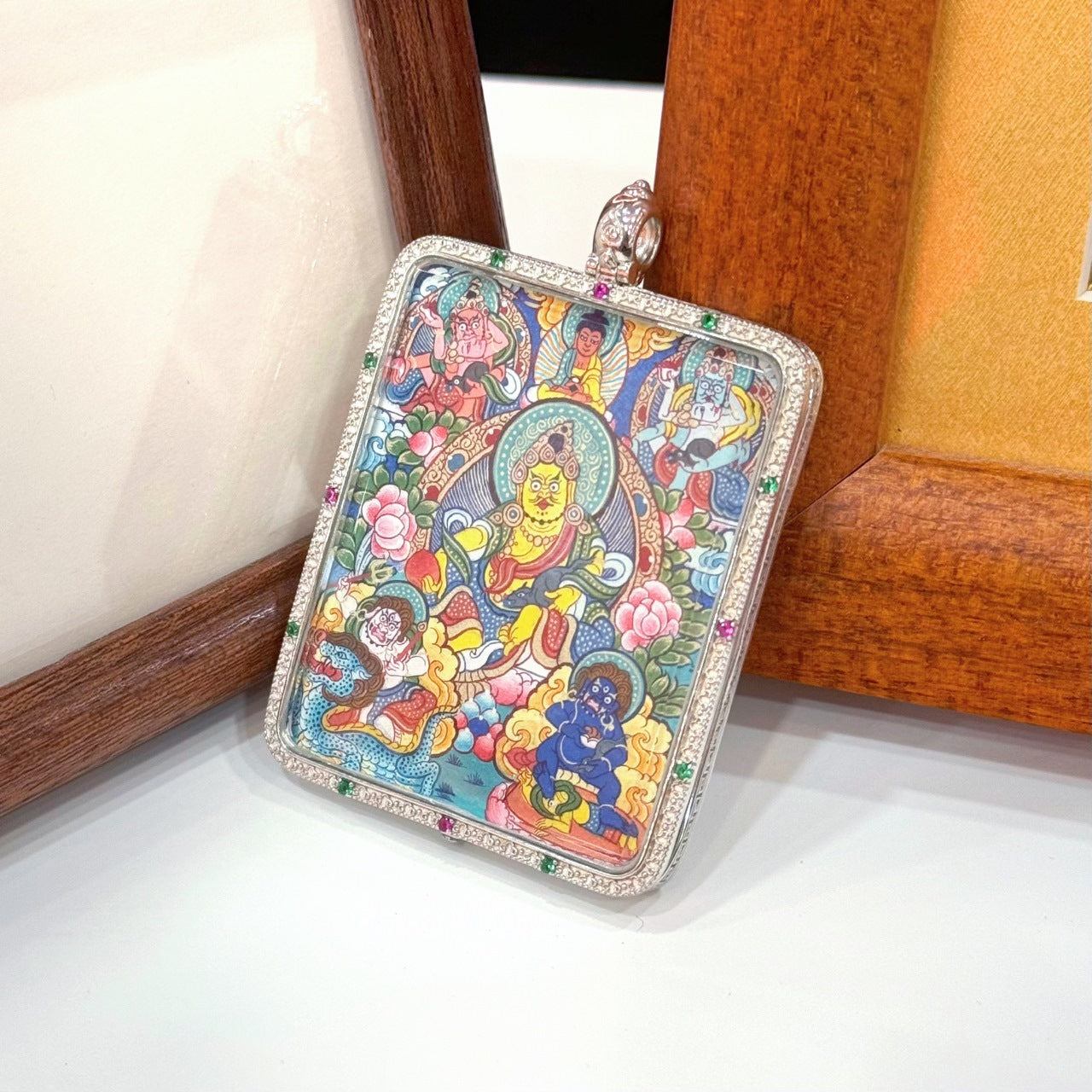  Hand-painted Rebgong Five Directional Wealth Deities Thangka pendant featuring the five Jambhalas, encased in silver, representing comprehensive wealth and merit in Tibetan Buddhist tradition.