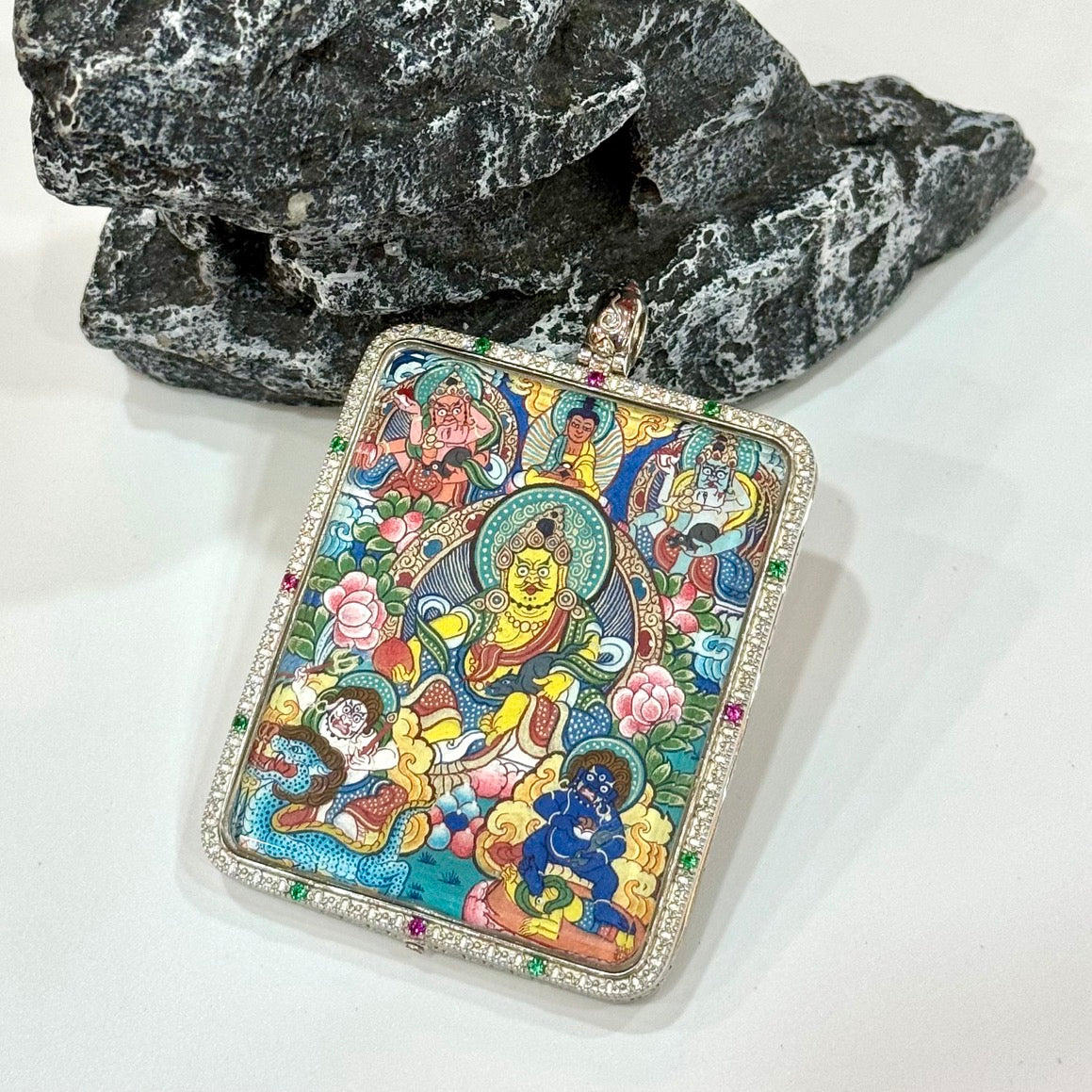  Close-up detail of the Rebgong Five Jambhalas Thangka painting showing intricate natural mineral pigment work, showcasing the masterful artistry of Rebgong lineage painters.
