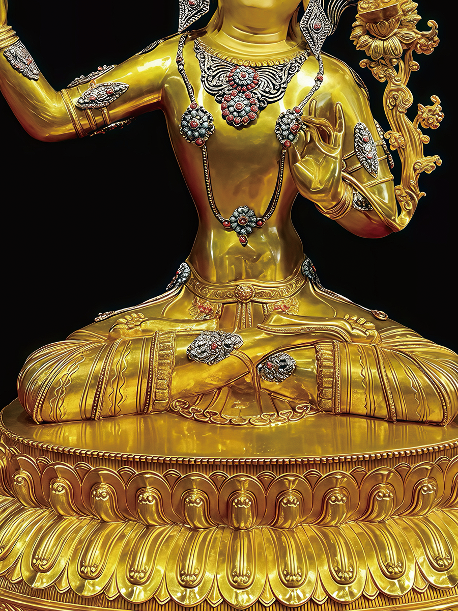 Shining golden Manjushri holding the wisdom sword, showcasing the sacred brilliance of Tibetan Buddhist statues and Buddha Statue-Art.