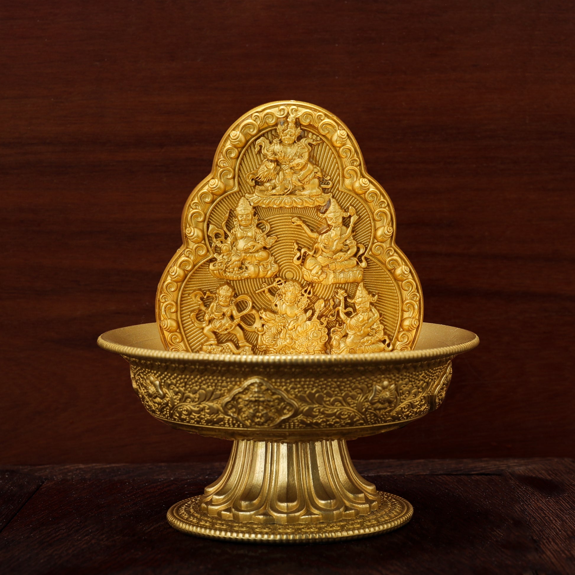 Six hand-carved brass Wealth Deities, embodying abundance and good fortune, inspired by Tibetan Buddhist ritual implements culture.