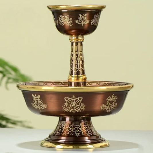 Tibetan Buddhist sacrificial implements culture: A set of pure copper offering bowls featuring the Eight Auspicious Symbols for daily sacred water rituals.