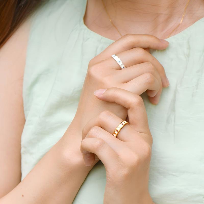 Artisan-crafted gilded silver rings inlaid with red gemstones, perfect for eternal love and Jewelry art style.