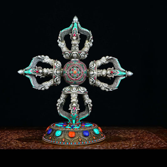 Handcrafted pure silver cross Vajra, symbolizing spiritual power, wisdom, and protection in Tibetan Buddhist ritual implements culture.