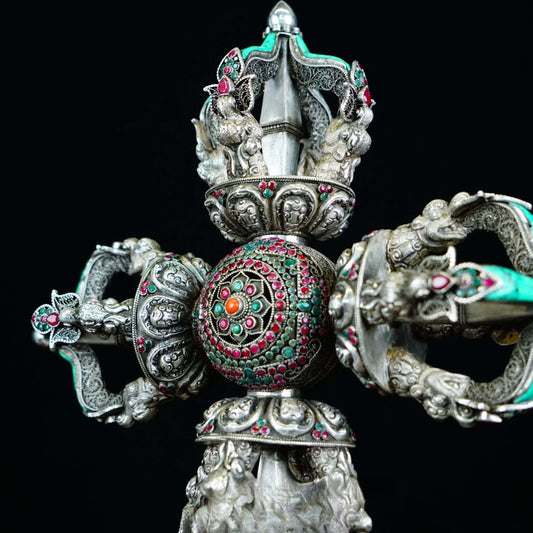 Silver cross Vajra, meticulously handcrafted to represent wisdom, compassion, and spiritual strength in Buddhist ritual implements art.