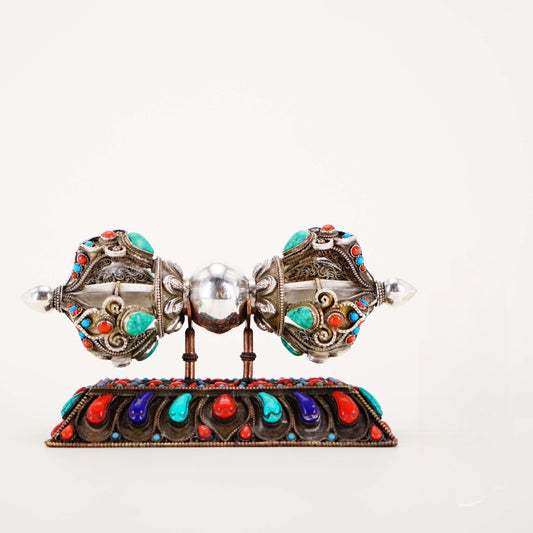Handcrafted silver Vajra, representing the indestructible nature of wisdom and power in Tibetan Buddhist ritual implements culture.