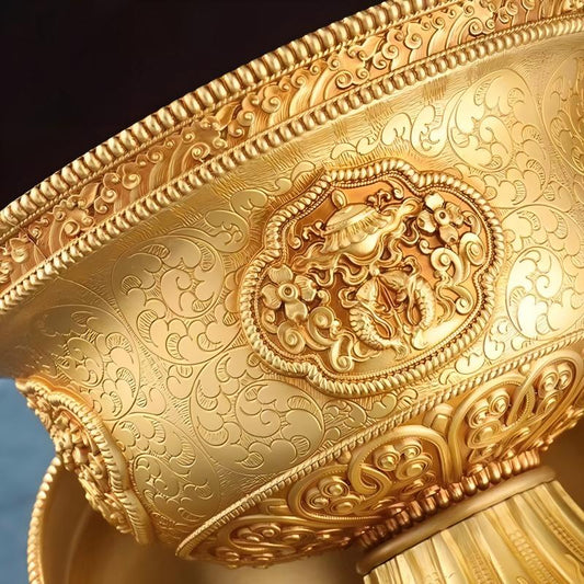  Intricate hand-carved copper offering cup, showcasing artisan jewelry art inspired by the sacred traditions of Tibetan Buddhist Jewelry Culture.