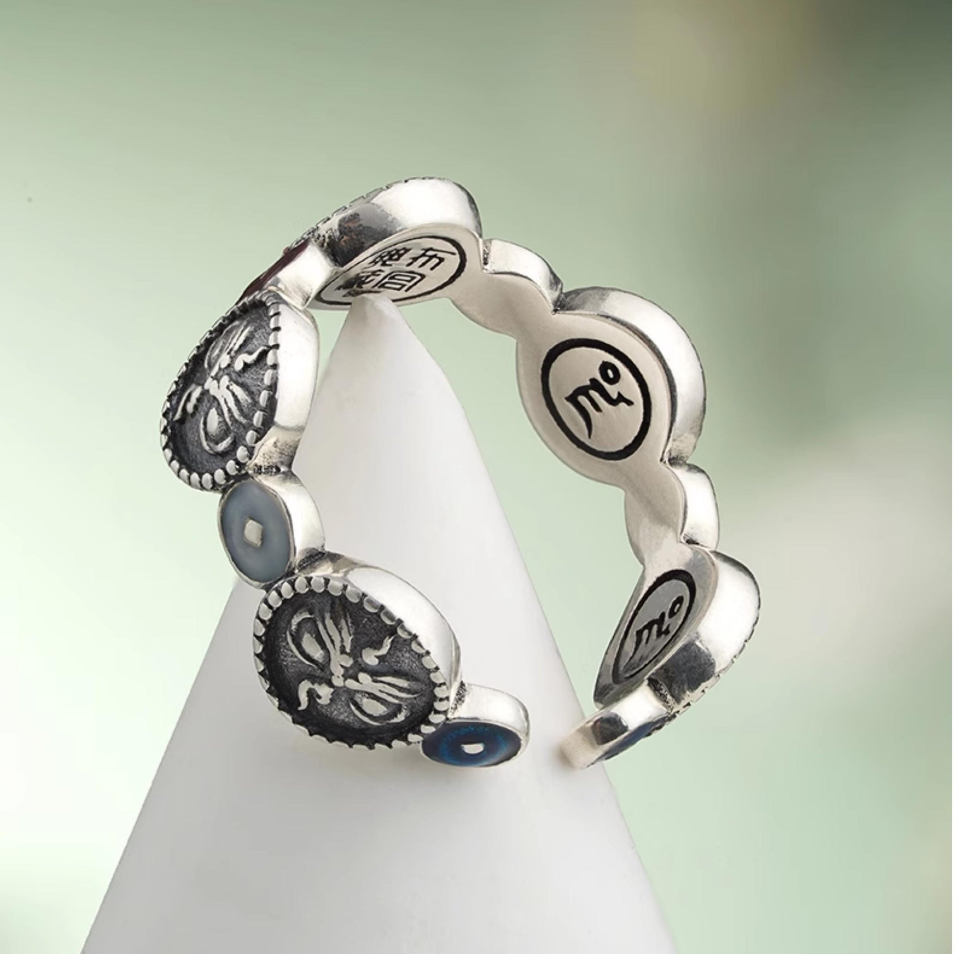 Handmade Tibetan Buddhist Jewelry Culture five directions prosperity ring crafted in 925 silver, showcasing detailed hand-painted Jewelry art.