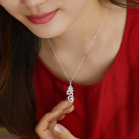 Tibetan Buddhist Jewelry Culture: A handmade antique sterling silver peace pendant, showcasing sacred Buddhist sacrificial items art and spiritual tranquility.