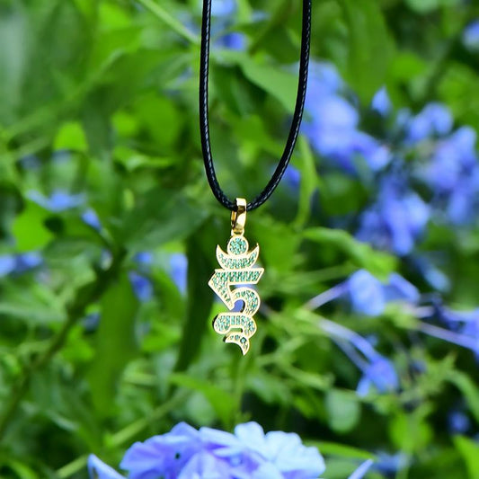 Tibetan Buddhist Jewelry Culture: A handmade sterling silver seed syllable Ruyi pendant, showcasing sacred Buddhist sacrificial items art and auspicious symbols.